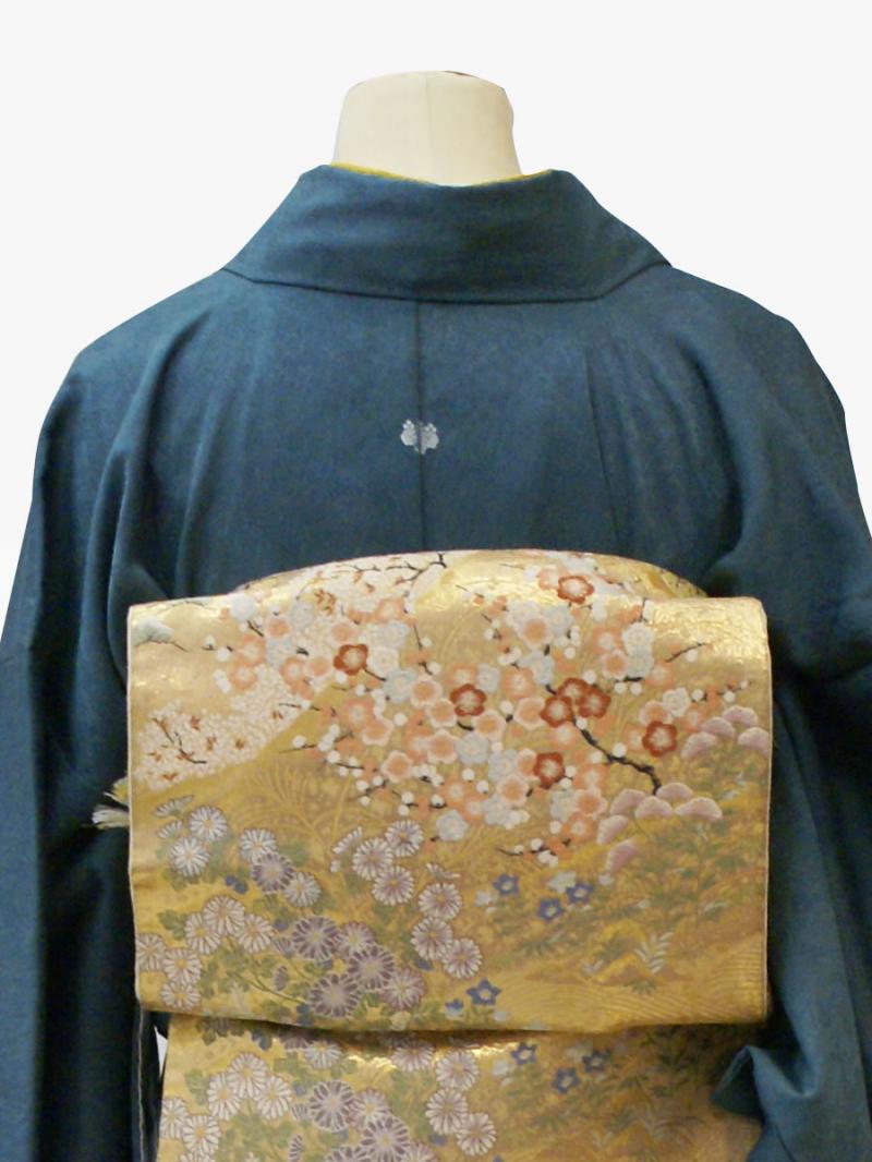 青緑色の扇面流水花柄の色留袖